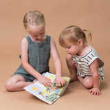 Quiet Busy Book Taf Toys – Libro Sensorial Montessori para Niños (18m+)